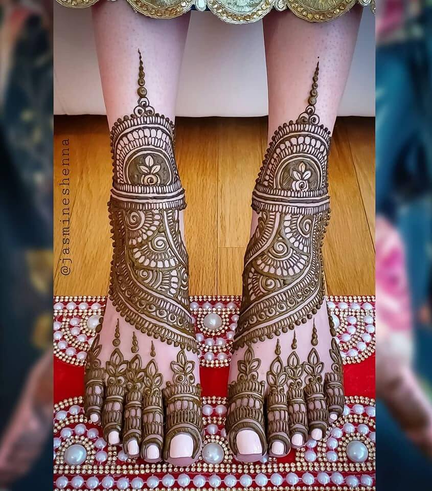 Traditional Bridal Foot Mehndi Design with Paisley and Floral Motifs