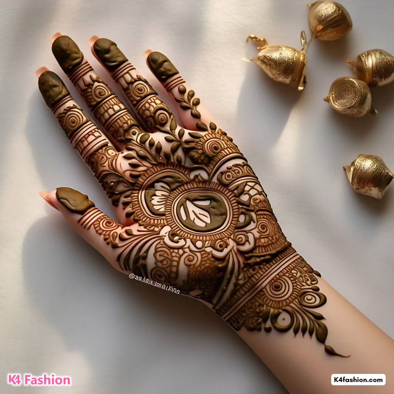 Artistic Mehndi Design on Hand with Golden Accents