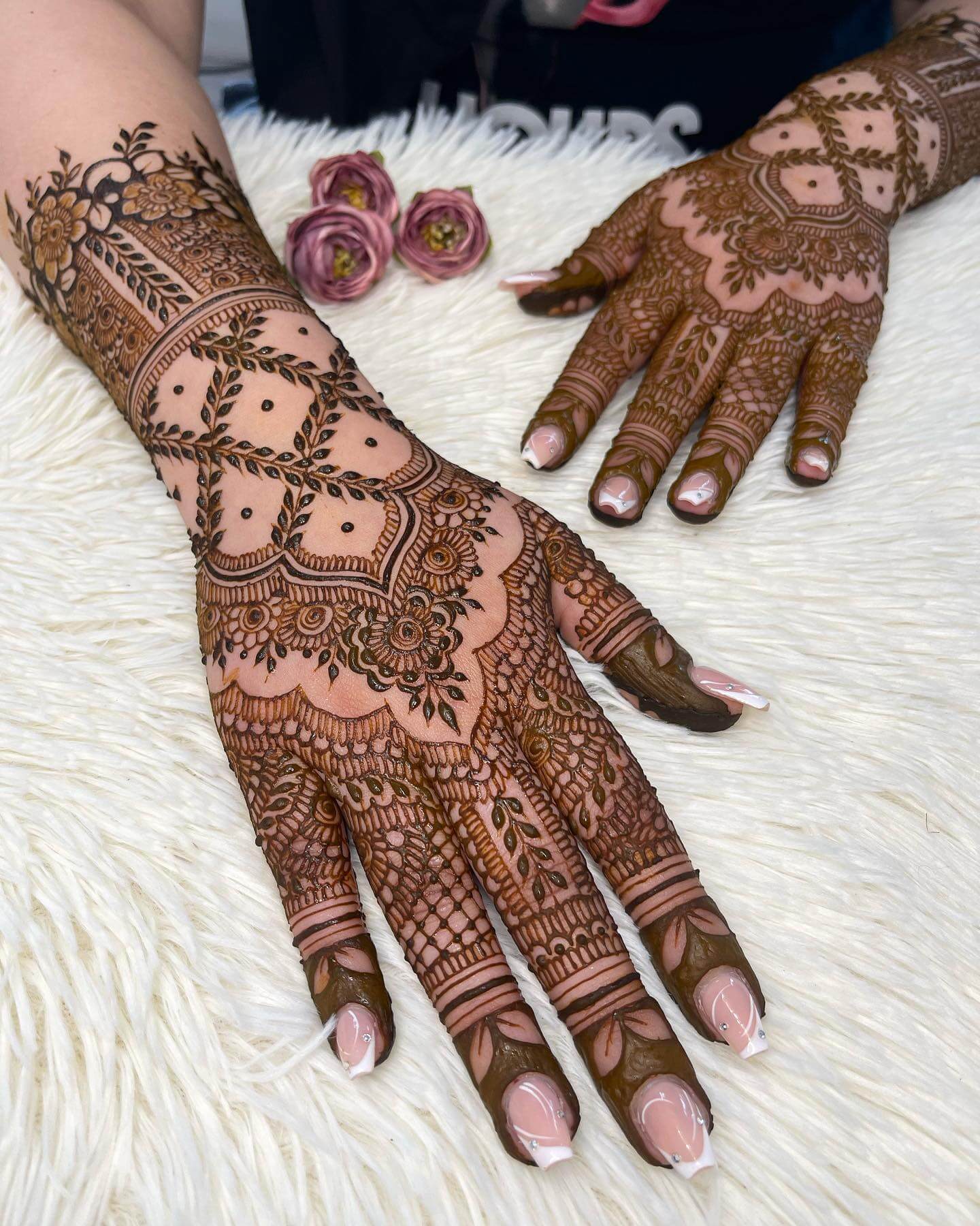 Floral Mehndi Design with Intricate Patterns and Elegant Nail Art