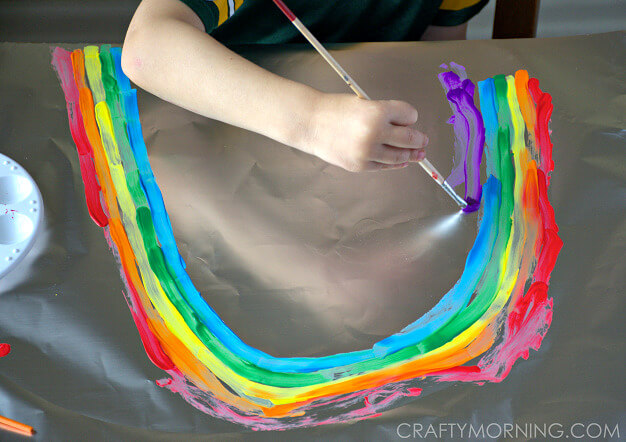 Beautiful Rainbow Painting Art Activity On Tin Foil - Introducing aluminum foil art to preschoolers.