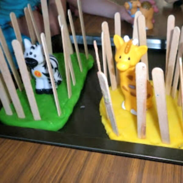 Fun To Make Zoo Craft Using Clay, Popsicle Sticks & Animal Toys - Possibilities for Art from Popsicle Sticks 