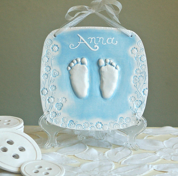 Adorable & Cute Frozen Footprint Craft Made With Clay - Create a lasting reminder of a baby with a clay footprint.