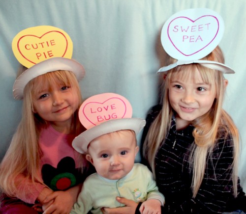 Adorable Paper Plate Craft With Written Nicknames on Hats - Creating paper plate headgear for a party
