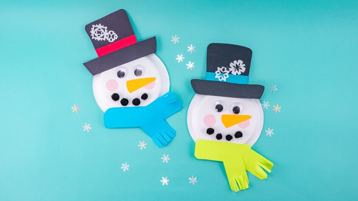 Adorable Snowman Paper Plate Craft Activity With Mini Snowflakes, Pom Pom,  Colorful Construction Paper - Assembling a Snowman from a Paper Plate - Wintertime Crafts for Kids