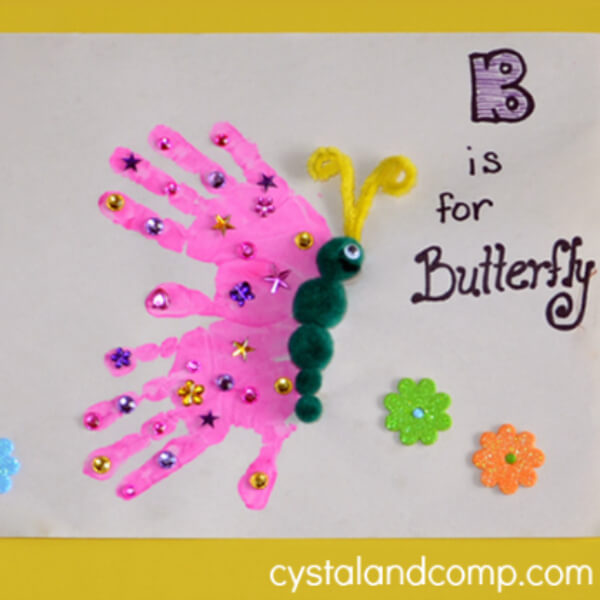 B Is For Butterfly Handprint Insect Animal Art Idea Using Paper, Pom Pom, Pipe Cleaners & Sequins - Art made by the hands of toddlers