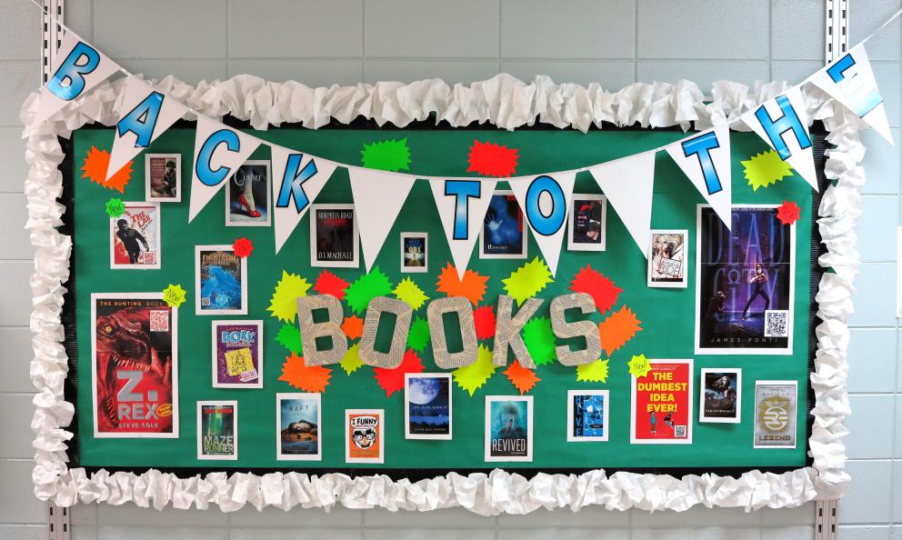 Back To The Books - Beautiful Library Bulletin Board Idea With Printed Photographs - Ways to Decorate Library Bulletin Boards