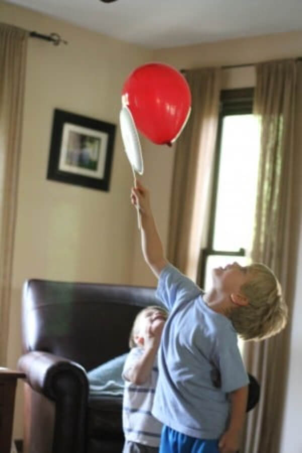 Balloon Badminton Game Activity Made With Paper Plate & Popsicle Sticks - Engaging Balloons Games For Little Ones Indoors