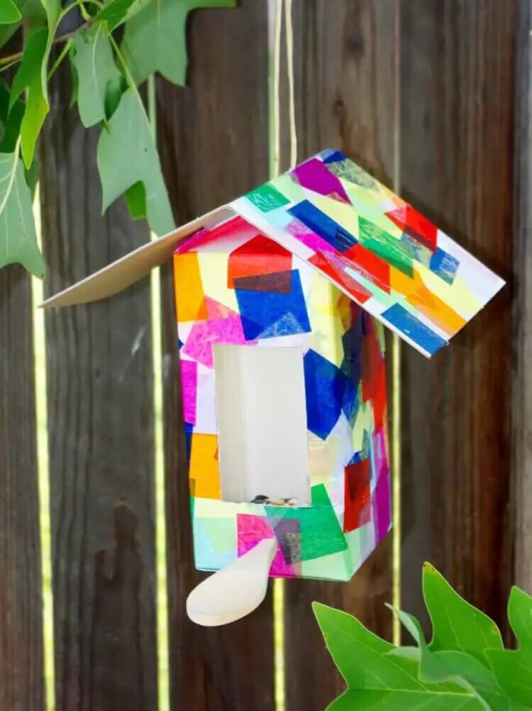 Beautiful Birdhouse & Bird Feeder Made With Cardboard, Tissue Paper, Bird Seed, Wooden Spoon, & Twine - Making a bird feeder from a milk carton