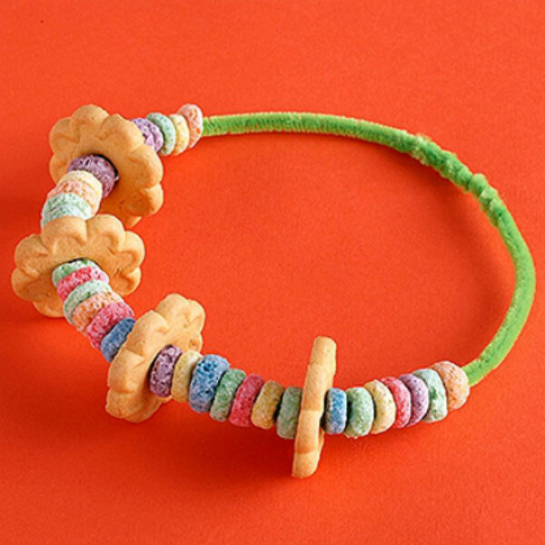 Beautiful Cereal Necklace Craft Idea For Kids - Ideas for younger kids to utilize cereal in a fun manner. 