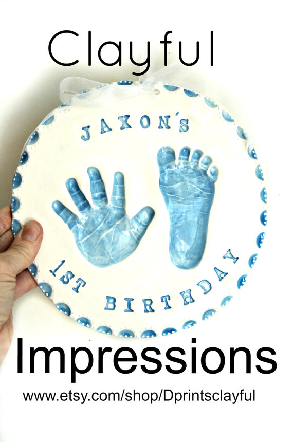 Beautiful Clay Footprint Gift Idea For 1st Birthday Baby - Create a clay footprint of a baby to keep forever.