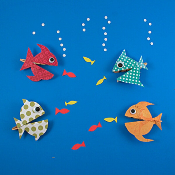 Beautiful Hungry Fish Clothespins Craft Using Scrapbook Paper & Googly Eyes - Engaging Clothespin Projects for the Tiny Tots 