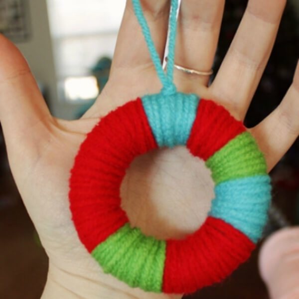 Colorful Mini Yarn Wreath Ornament Craft Idea For Christmas Gifts - Constructing Christmas Adornments for Kids