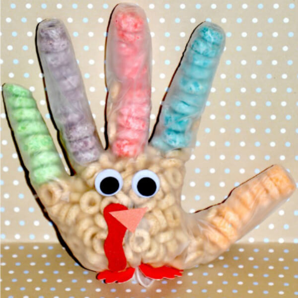 Colorful Turkey Glove Craft Idea For Kids Using Cereal, Paper & Googly Eyes - Artistic Cereal Activities For Pre-K Students
