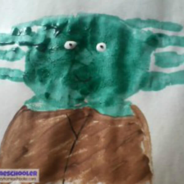 Creative Handprint Yoda Star Wars Craft Idea Using Green, Brown Paints, Googly Eyes & Marker - Toddlers Making Art with Their Hands