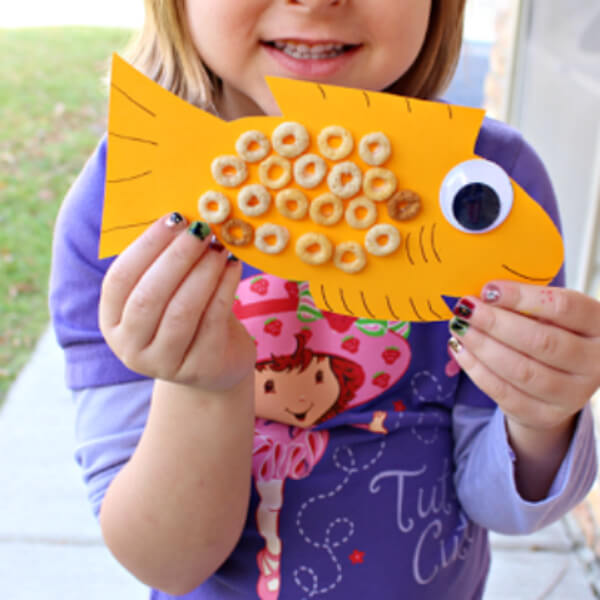 Cute Cereal Goldfish Craft Using Paper, Marker & Googly Eyes For Kids To Make - Fun Projects Constructed From Cereal For Preschoolers