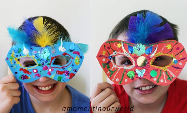 DIY Brazilian Carnival Mask Made With Printable Mask, Small Colorful Feathers, Sequins, Glitter Glue & Paddle pop Sticks - Hand-crafted Brazilian Mardi Gras Outfits