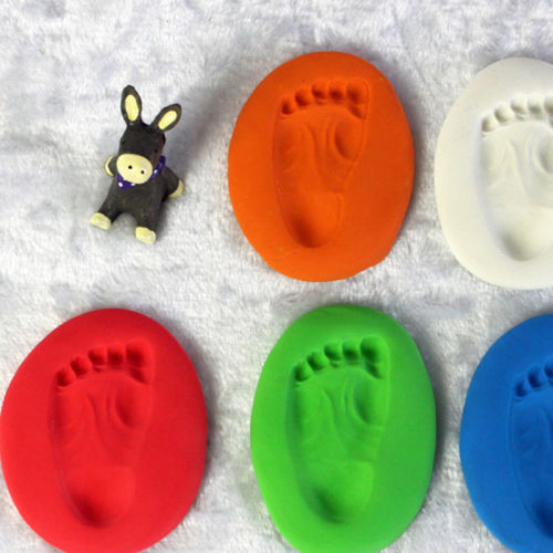 DIY Clay Footprints Craft For Little Ones - Crafting a clay footprint of a baby to save as a keepsake.