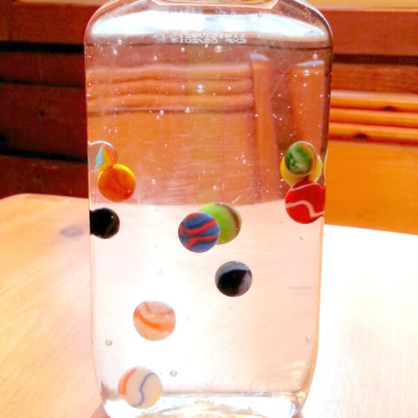 Easy & Simple Corn Syrup and Marbles Activity In Discovery Bottle For Kindergartners - Crafting Exploration Bottles For Little Ones