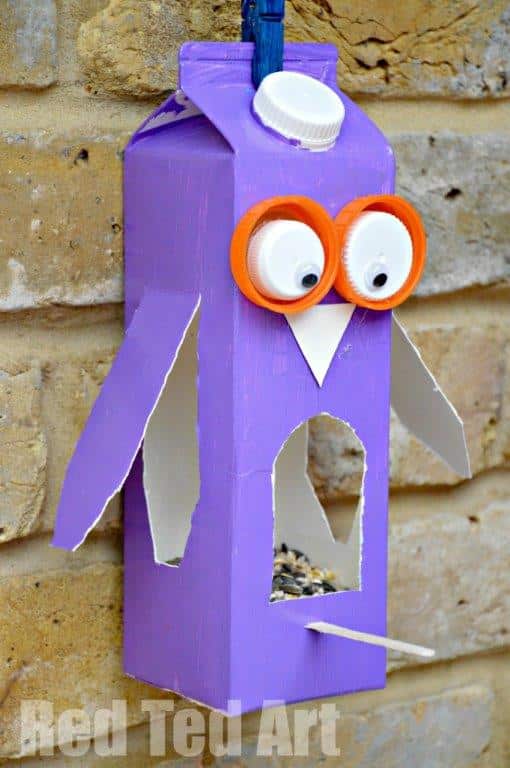 Easy Owl Bird Feeder Craft Using Milk Carton, Googly Eyes, & Craft Stick - Turning a milk carton into a bird feeder