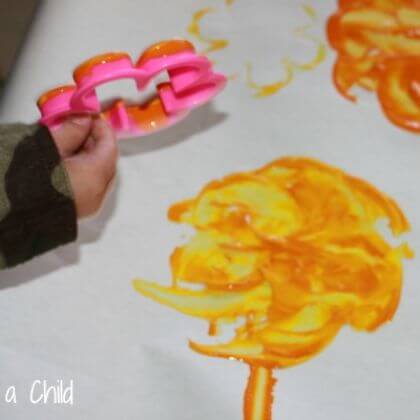 Easy Spring Painting Art Activity Using Cookie Cutter - Vibrant tasks and artistry for tots 