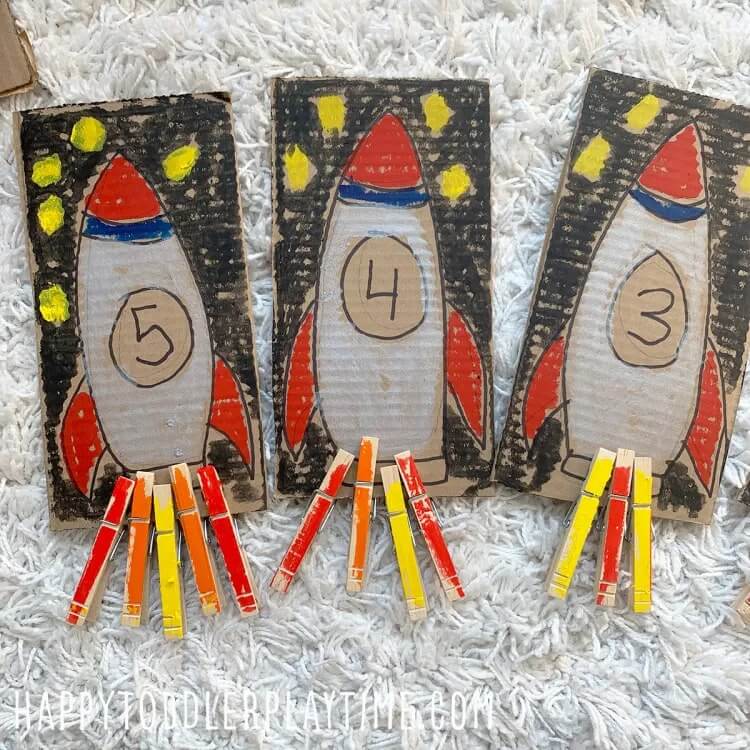 Exciting Rocket Ship Counting Game Activity With Clothespins, Cardboard & Color - Utilizing clothespins to teach
