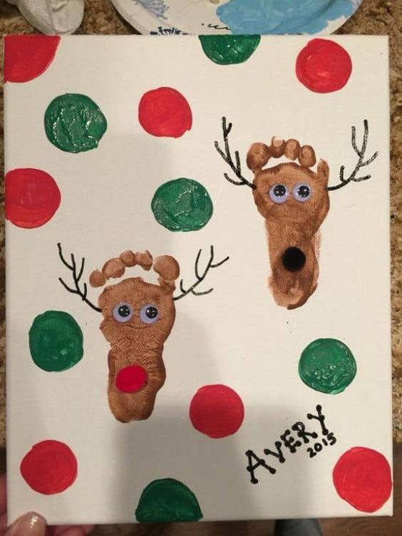 Footprint Reindeer Christmas Craft Idea For Kindergartners - Inexpensive ways to make Christmas crafts with kids.