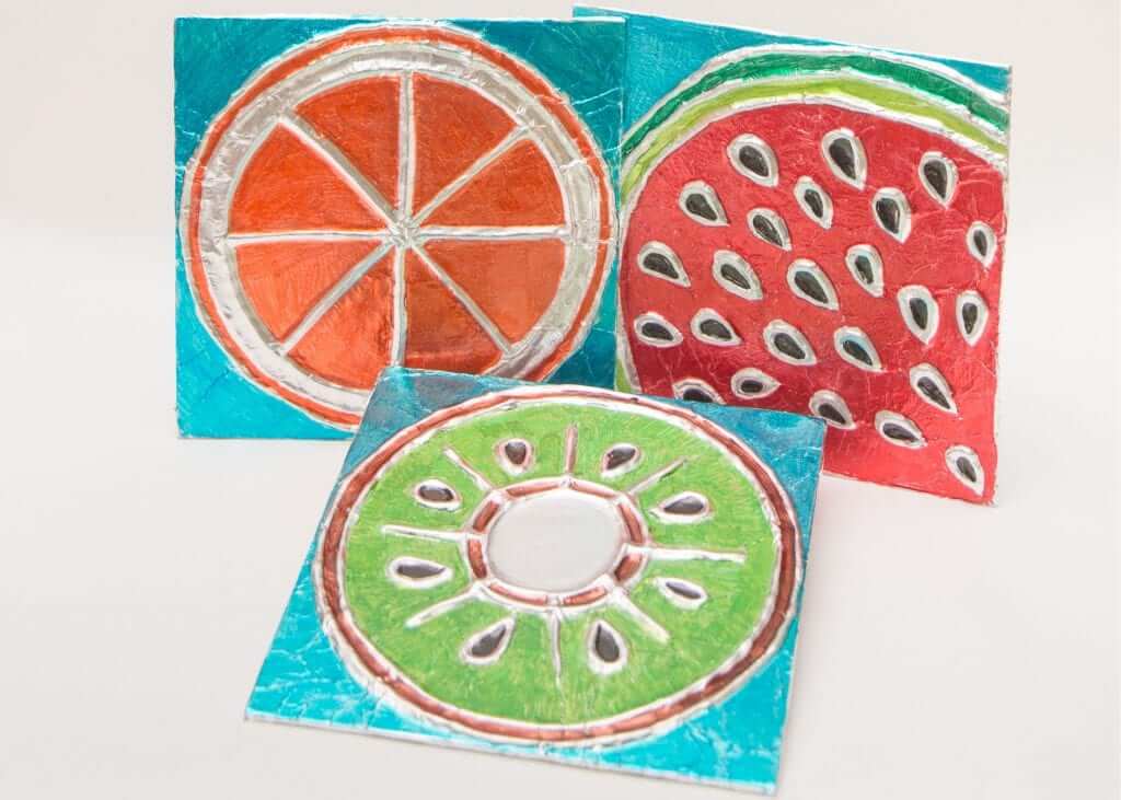Fruit-Inspired Tin Foil Art Activity For Kids Using Canvas Board, Spray Adhesive & Marker - Arts and crafts using aluminum foil for young children. 
