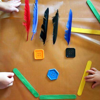 Fun Popsicle Sticks Art Activity With Colorful Feathers & Buttons - Enjoyable doings and creations for toddlers 