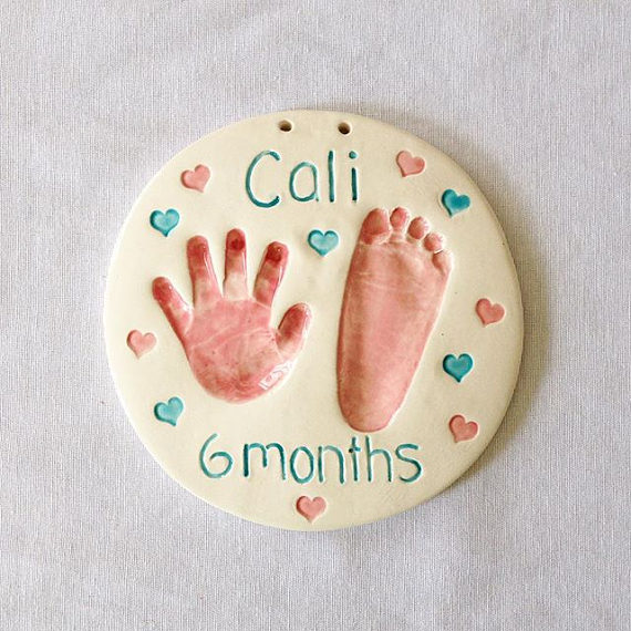 Hand & Footprint Clay Craft Idea For 6 Month Baby  - Make a clay mold of a baby's footprint as a keepsake.