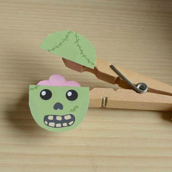 Handcrafted Zombie Puppet Craft Using Paper & Clothespin - Creative Projects Utilizing Clothespins for Kids 