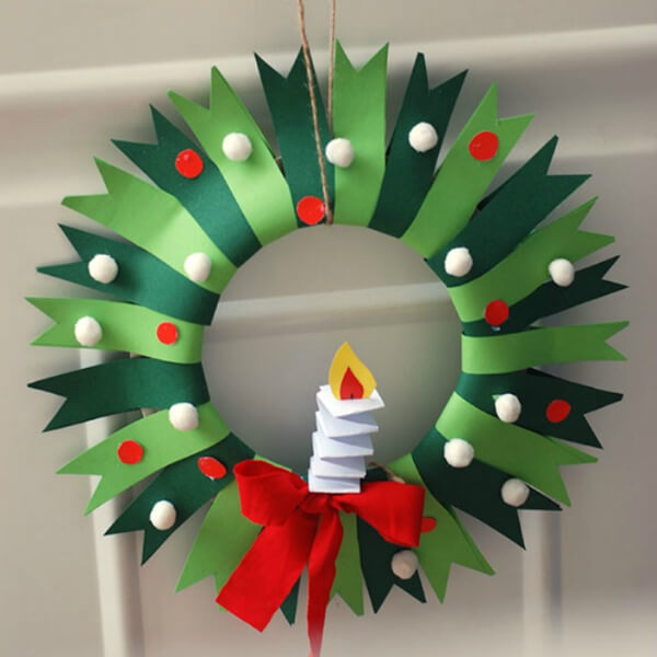 Handmade Christmas Wreath Craft With Candles Using Paper Plates, Pom Pom, Red Ribbon, and Colorful Papers - Crafting a Christmas Wreath