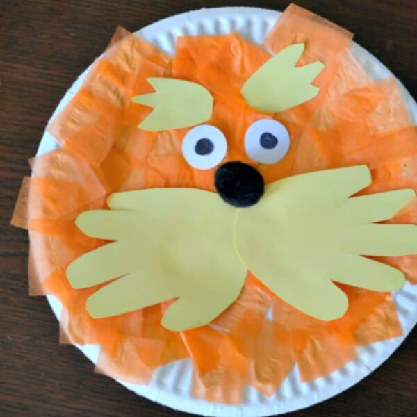 Handmade Lorax Paper Plate Craft With Tissue Paper, Handprint & Pom Pom - Creative Projects Based On Dr. Seuss For Pre-Schoolers