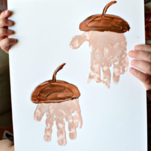 Handprint Acron Fall Art & Craft Idea For Toddlers - Hand-drawn creations and activities for pre-schoolers