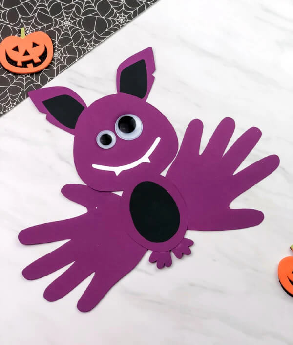 Handprint Halloween Bat Craft Template With Free Printables, Construction Paper & Googly Eyes - Producing Halloween art pieces with lightweight paper 