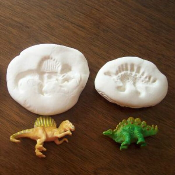 Hands-On Dinosaur Fossil Clay Print Craft Activity For Preschoolers - Stimulating Stone Age Activities for Young Ones