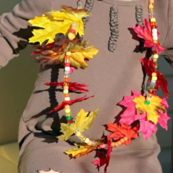 Homemade Necklace Craft With Beads, Autumn Leaves, & Yarn - Making Leaf Projects For Five To Seven-Year-Olds 