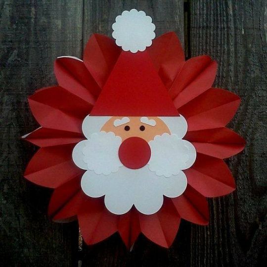 How To Make An Origami Santa Using Paper - Celebrate Christmas with creative projects for kids involving Santa Claus. 