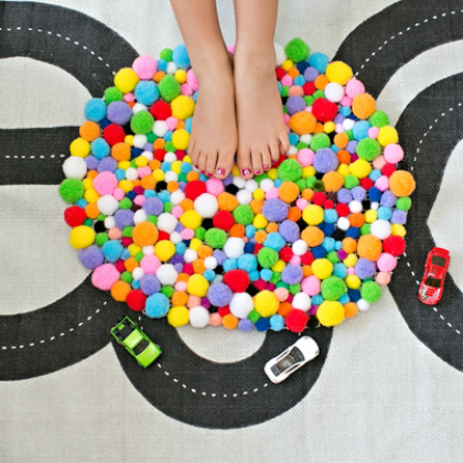 Inexpensive & Multicolored Pom Pom Rug Mat Craft For Kid's Room Decor - Producing Pom Poms at Home with Kids