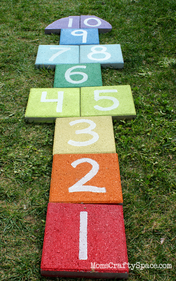 Learning Number Activity On Colorful Tiles On the Lawn - Enjoying the outdoors with youngsters.