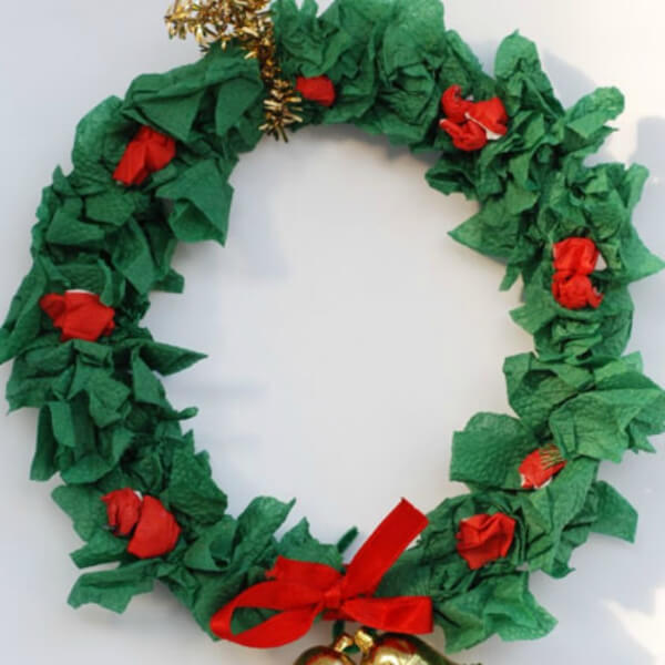 Lightweight Christmas Wreath Decoration Made With Paper Plate, Tissue Paper, Red Ribbon & Jingle Bell - Designing a DIY Christmas Wreath
