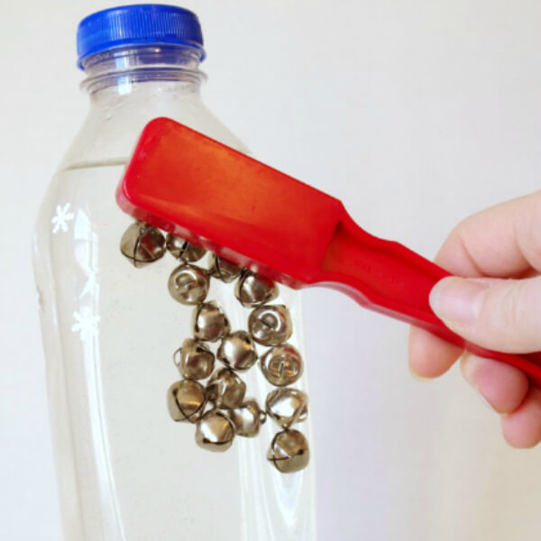 Magnetic Jingle Bell Discovery Bottle Activity For Christmas - The educational and entertaining value of a self-made discovery bottle for children.
