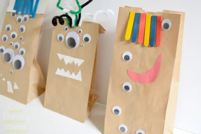 Multi-Eyed Paper Bag Monster Craft Made With Paper, Popsicle Sticks, Pipe Cleaners & Googly Eyes - Projects Using Halloween Paper Bags