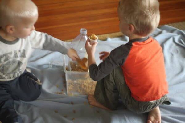 Pasta Touch & Sound - Sensory Bin Play Activity For Preschoolers - Engaging in tactile activities that support the advancement of kids.