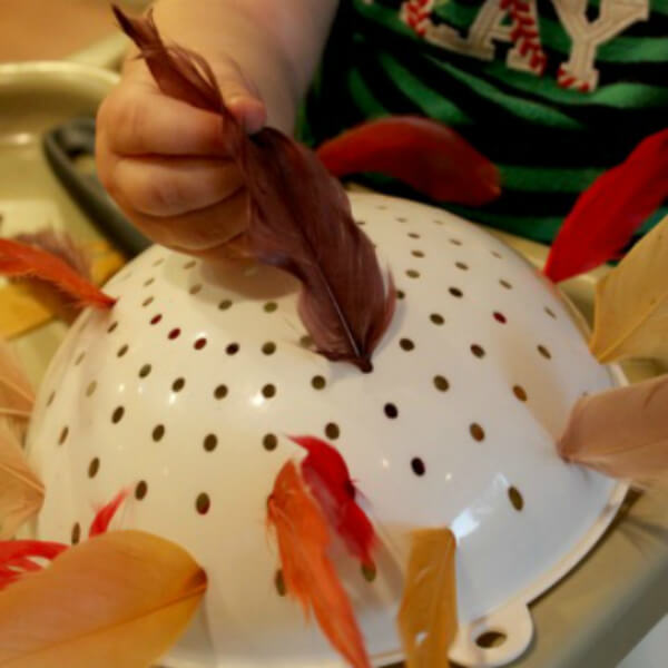 Quick & Easy Thanksgiving Colander Game Activity With Colorful Feathers - Arts & Crafts to Celebrate Thanksgiving