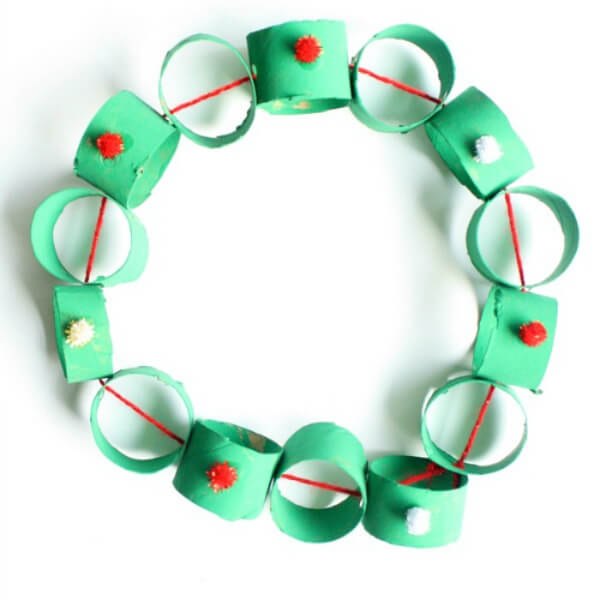 Recycled Christmas Wreath Craft Using Cardboard Tubes, Mini Pom Pom & Red Yarn - Constructing a Christmas Wreath at home