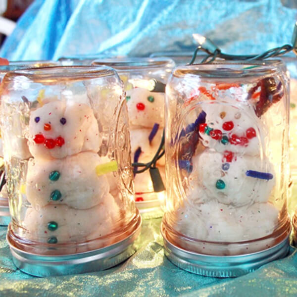 Snowman Playdough Globe Activity in Empty Mason Jars Using Pipe Cleaners, Assorted Beads, Googly Eyes & Buttons - Snow-Based Projects to Enjoy the Winter Vacation