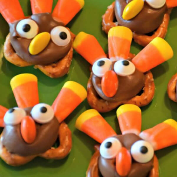 Thanksgiving Turkey Pretzels Dessert Recipe Made With Hershey’s Kisses, Candy Corn & Candy Eyes - Preparing snacks for bigger kids during autumn