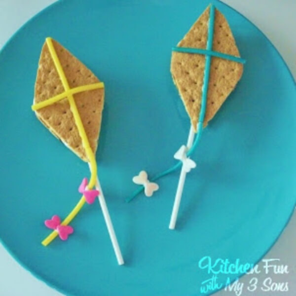 Yummy Kite Snack With Sandwich of Crackers Stuffed With Marshmallows - Working on homemade kites with preschoolers 