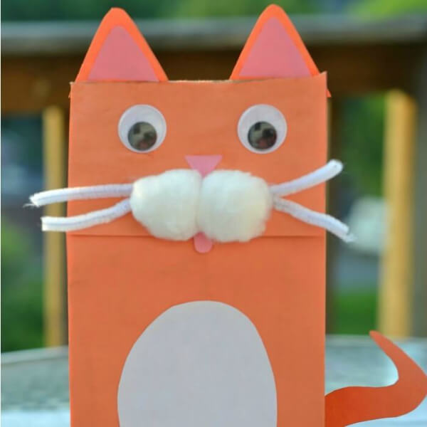 Adorable Paper Bag Cat Puppet Craft Using Construction Papers, Googly Eyes, Cotton Balls & Pipe Cleaners - Cat-Inspired Art Projects For Kids