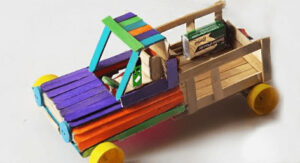 Amazing DC Motor Car Toy Craft With Popsicle Sticks, Battery, Plastic Bottle Caps & Buttons